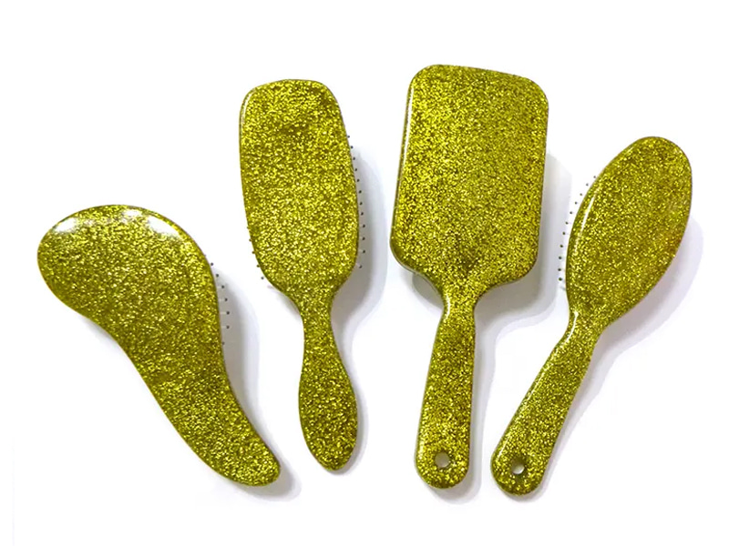 Brosse à cheveux démêlante à coussin pailleté