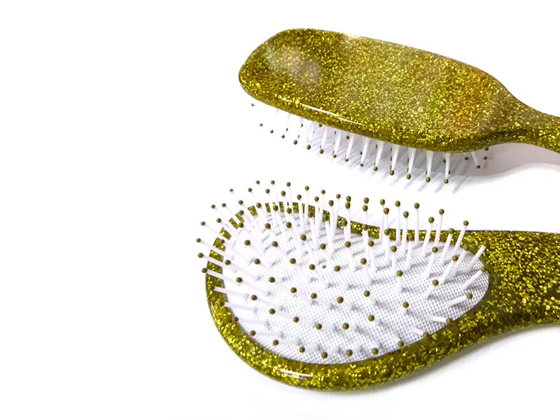 Brosse à cheveux démêlante à coussin pailleté