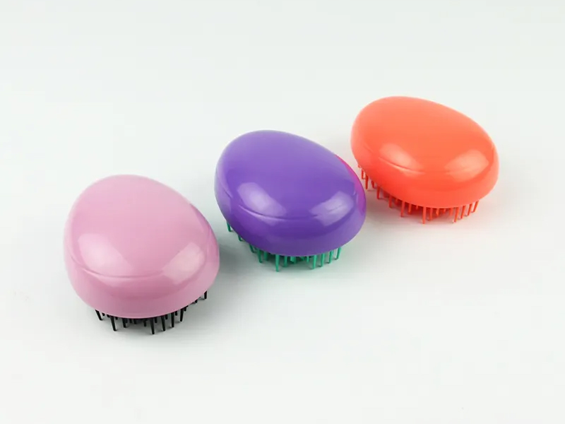 Mini brosse à cheveux pour enfants en forme d'œuf