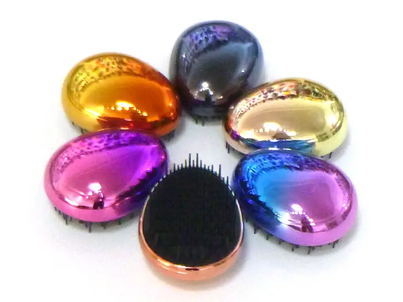 Mini brosse à cheveux démêlante galvanisée en forme d'œuf