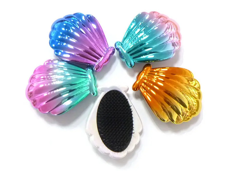 Mini brosse à cheveux démêlante galvanisée en forme de coquille pour enfants