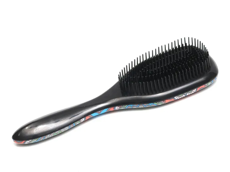 Brosse à cheveux démêlante bouclée en nylon coussin