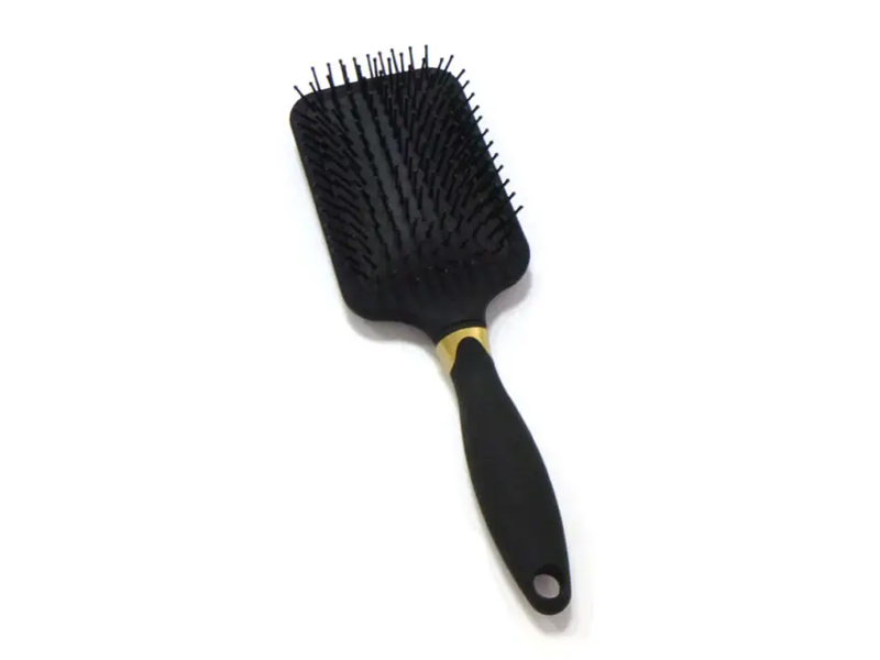 Brosse à cheveux démêlante avec revêtement en caoutchouc