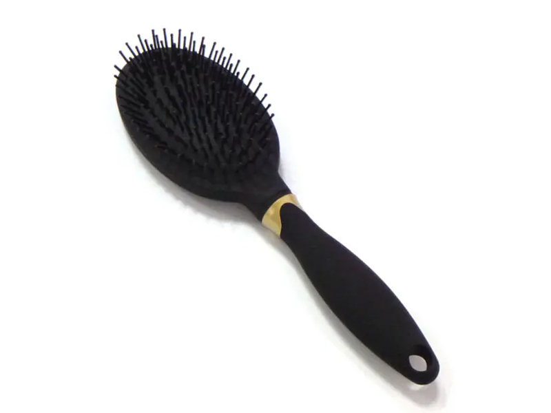 Brosse à cheveux démêlante avec revêtement en caoutchouc