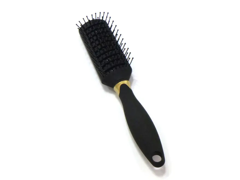 Brosse à cheveux démêlante avec revêtement en caoutchouc
