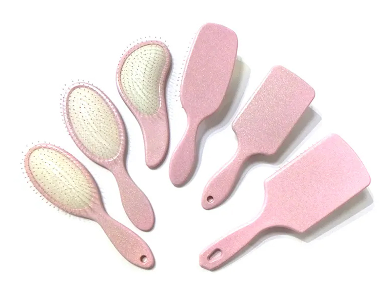 Brosse à cheveux fantaisie en plastique rose