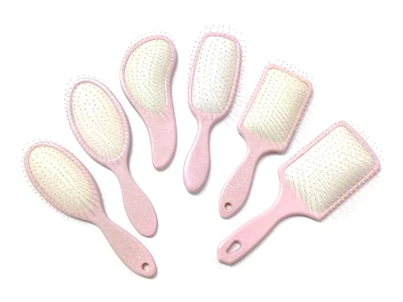 Brosse à cheveux fantaisie en plastique rose