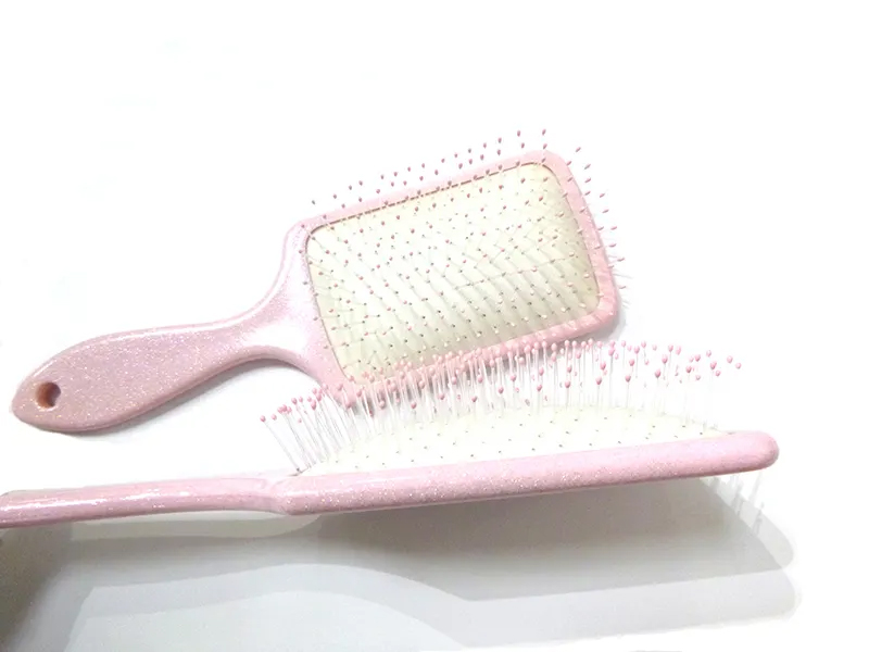 Brosse à cheveux démêlante rose