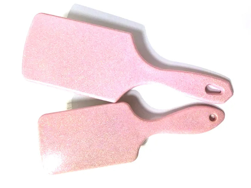 Brosse à cheveux fantaisie en plastique rose