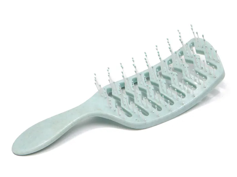 Brosse à cheveux démêlante imperméable qui respecte l'environnement d'abs portatif en plastique rose