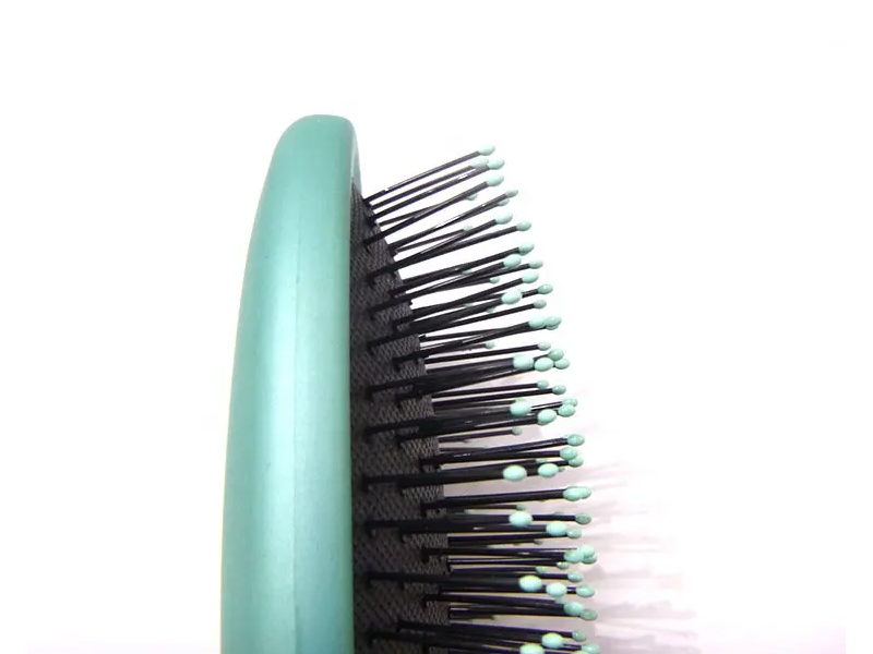 Brosse à cheveux ondulée noire ovale multicolore 360 ​​Tangle Denman