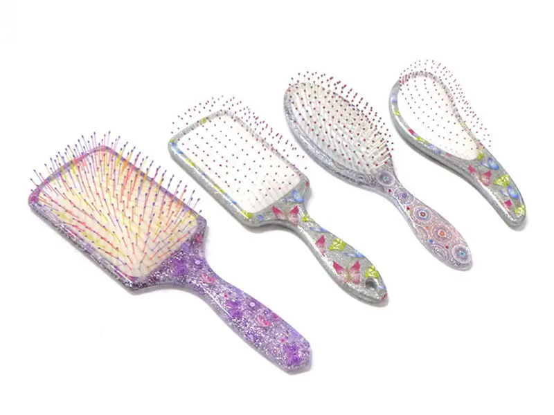 Mini brosse à cheveux démêlante en plastique doux au toucher