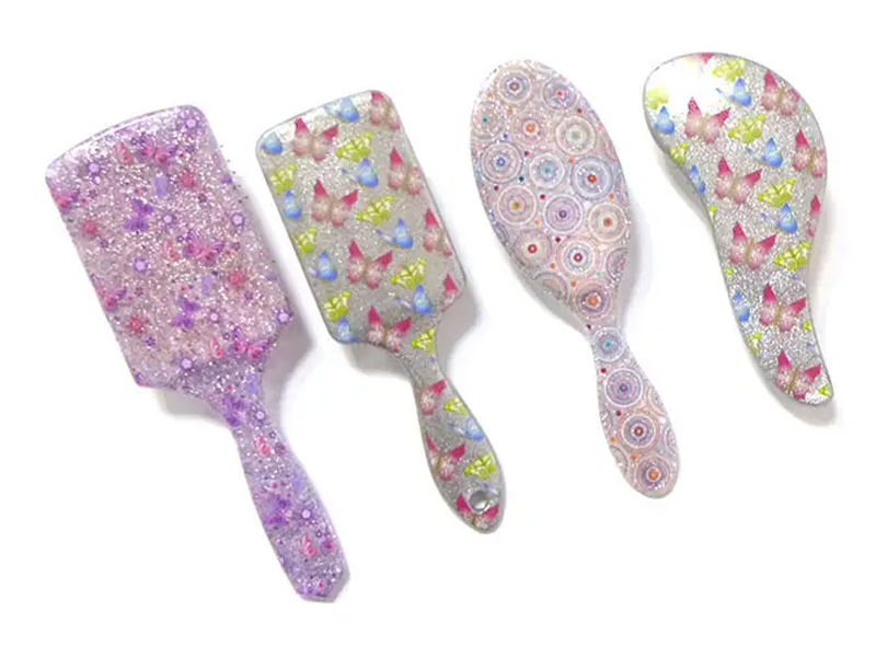 Mini brosse à cheveux démêlante en plastique doux au toucher