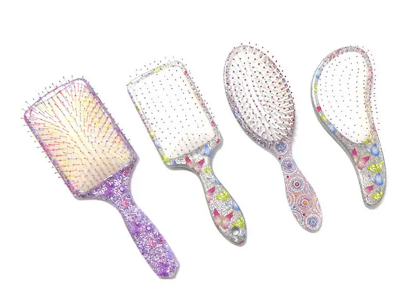 Mini brosse à cheveux démêlante en plastique doux au toucher