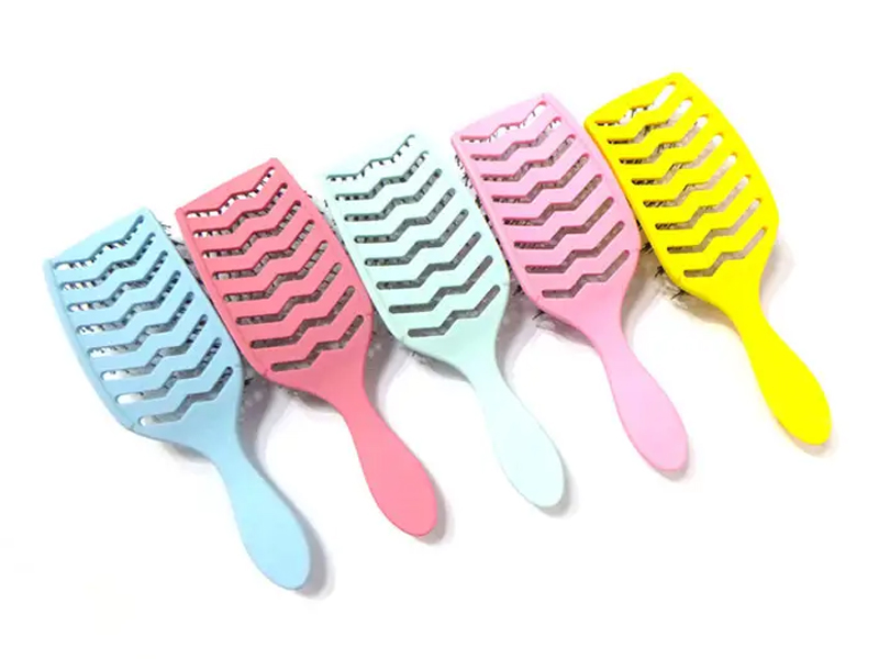Brosse d'extension de cheveux à palette d'aération incurvée