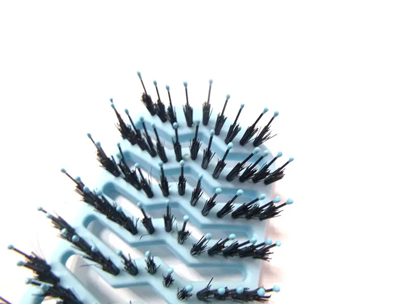 Brosse d'extension de cheveux à palette d'aération incurvée