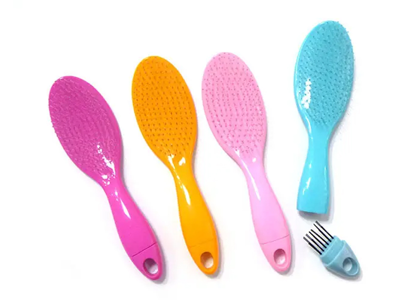 Brosse à cheveux démêlante autonettoyante couleur bonbon