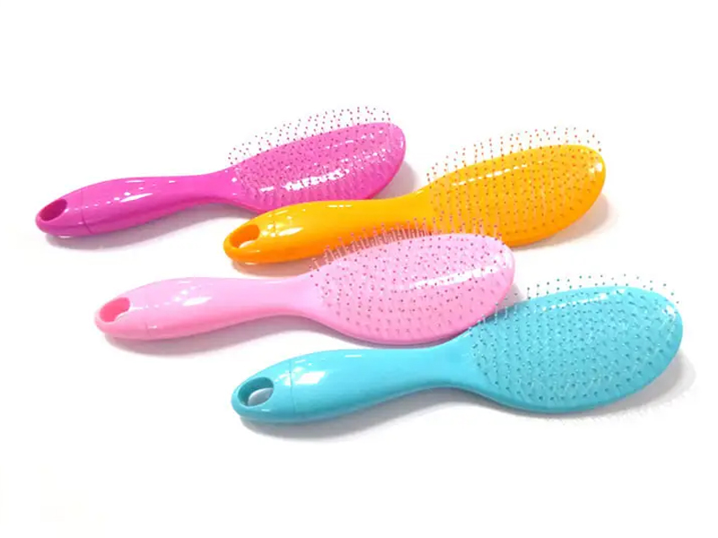 Brosse à cheveux démêlante autonettoyante couleur bonbon