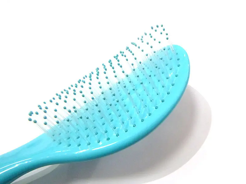 Brosse à cheveux démêlante autonettoyante couleur bonbon