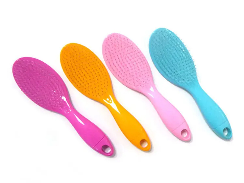 Peigne à cheveux rose résistant à la chaleur avec poignée amovible