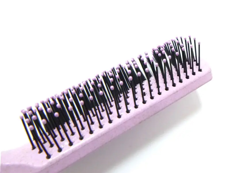 Brosse à cheveux démêlante colorée en plastique