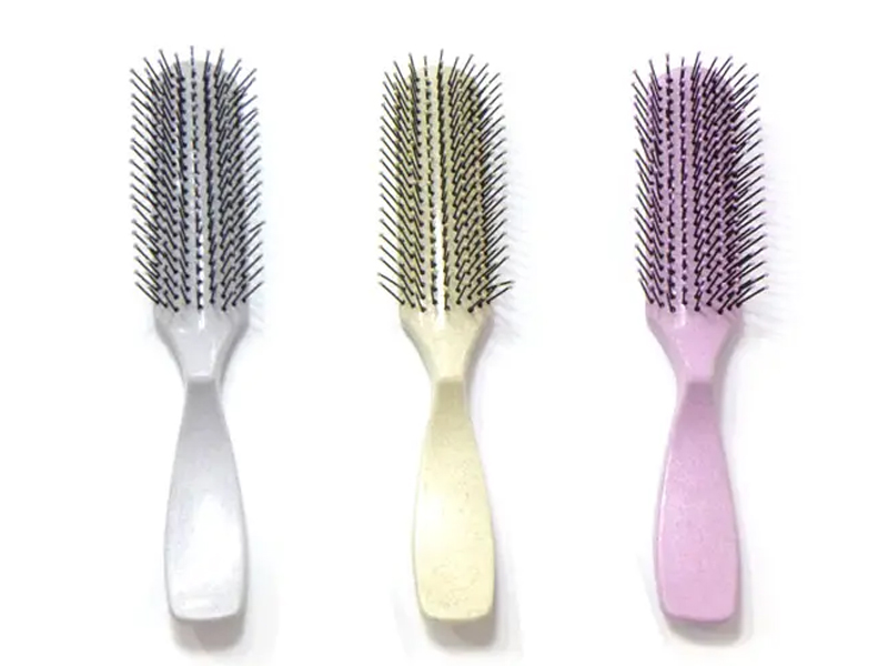 Brosse à cheveux démêlante colorée en plastique