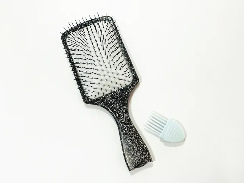 Brosse à cheveux à palette facile à nettoyer