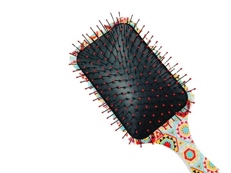 Brosse à cheveux démêlante avec coussin d'air