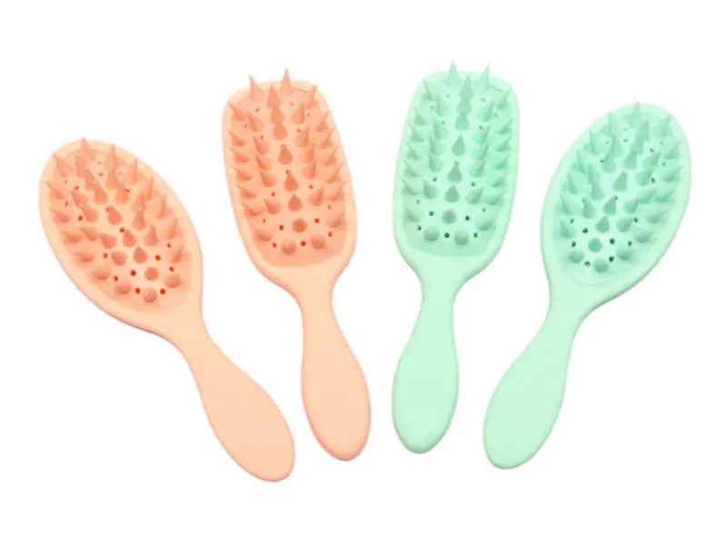 Brosse démêlante pour massage du cuir chevelu avec revêtement en caoutchouc