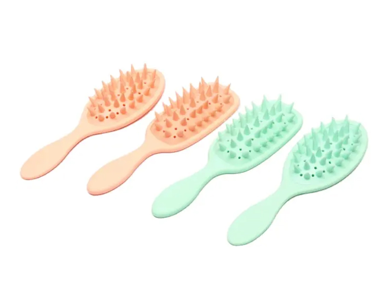 Brosse démêlante pour massage du cuir chevelu avec revêtement en caoutchouc