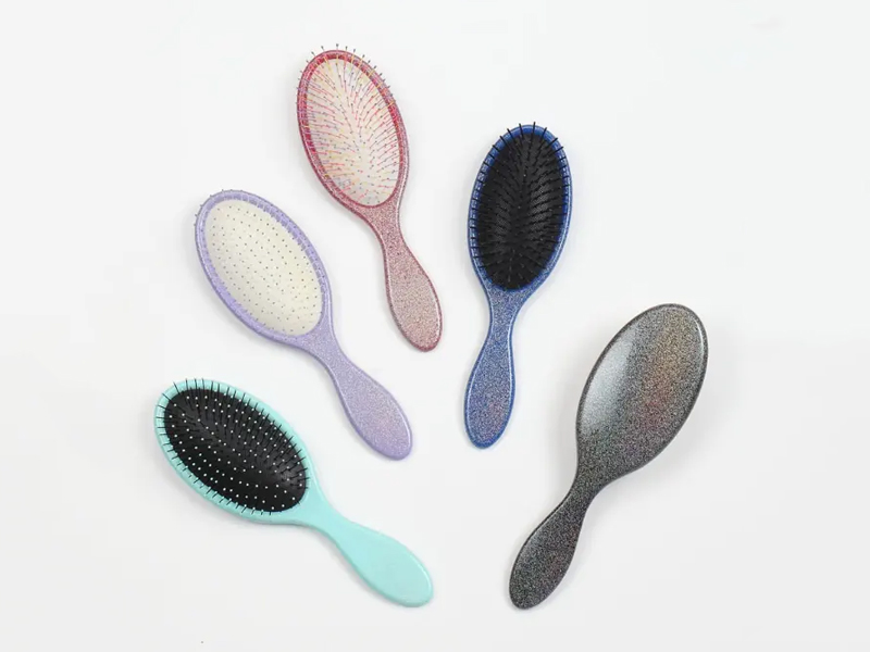 Brosse à cheveux à coussin démêlant en plastique à poils