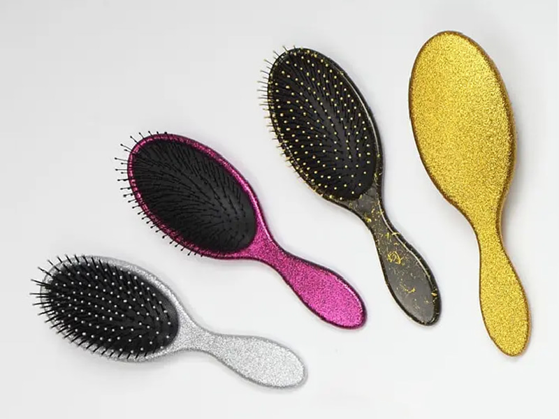 Brosse à cheveux à coussin démêlant en plastique à poils