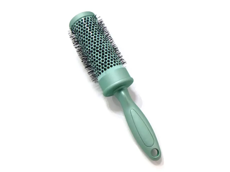 Brosse à cheveux ronde avec revêtement en caoutchouc doux au toucher