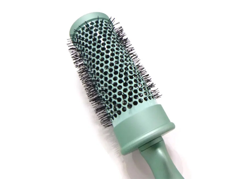 Brosse à cheveux ronde avec revêtement en caoutchouc doux au toucher
